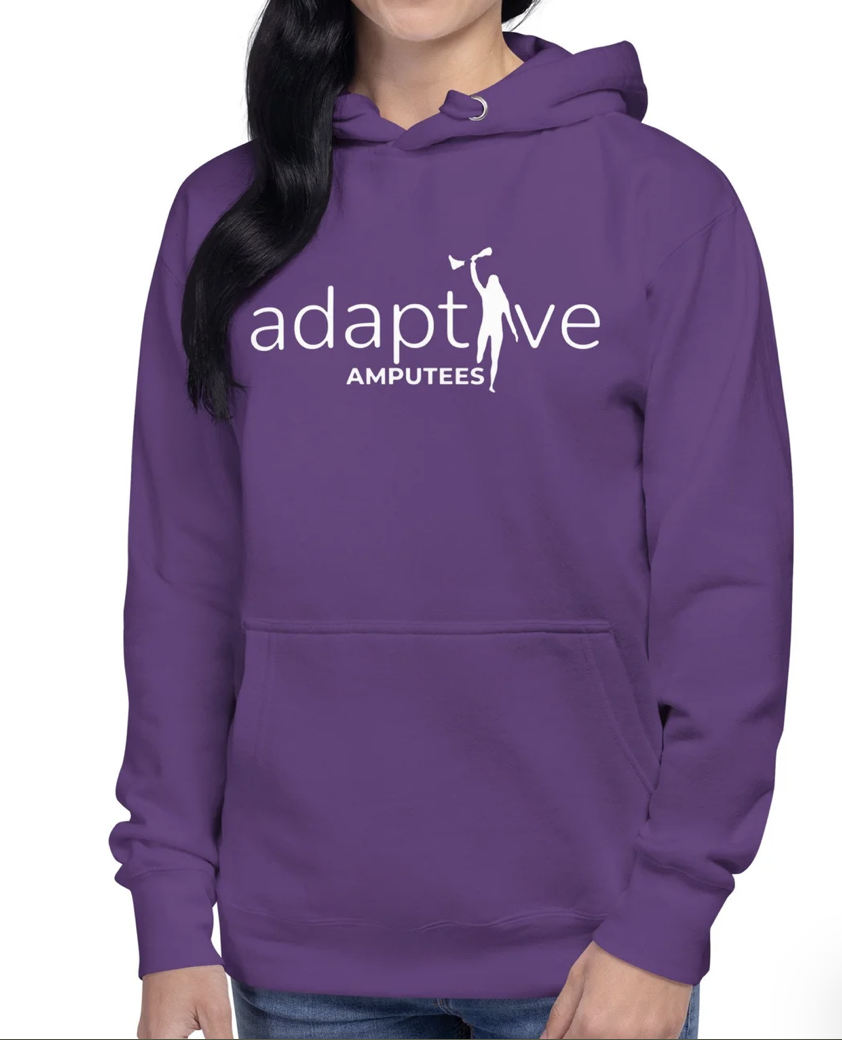 Woman wears purple hoodie with adaptive amputees logo
